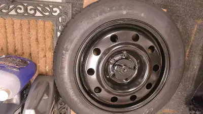 I am selling a brand-new spare tire assembly for a 2013 Ford Edge. This tire has never touched the r...