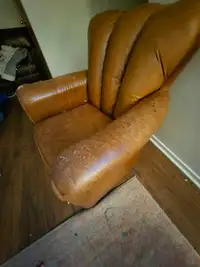 2 Used chairs, some damage to leather