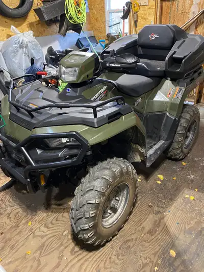 Nice ride, very comfortable with lots of power, included is backseat/storage/ winch and 2 helmets, b...