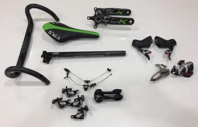 - Handlebars: FSA SL-K, carbon, 31.8 mm dia., 80 mm reach, 125 mm drop, with openings for internal r...