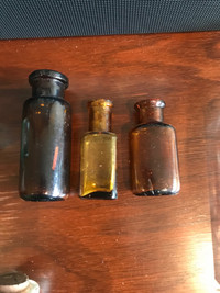 10 small medicine bottles $4.00 each, all found in PEI