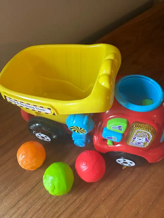 VTech Drop & Go Dump Truck - drop the rocks through the hole 63735877243521124