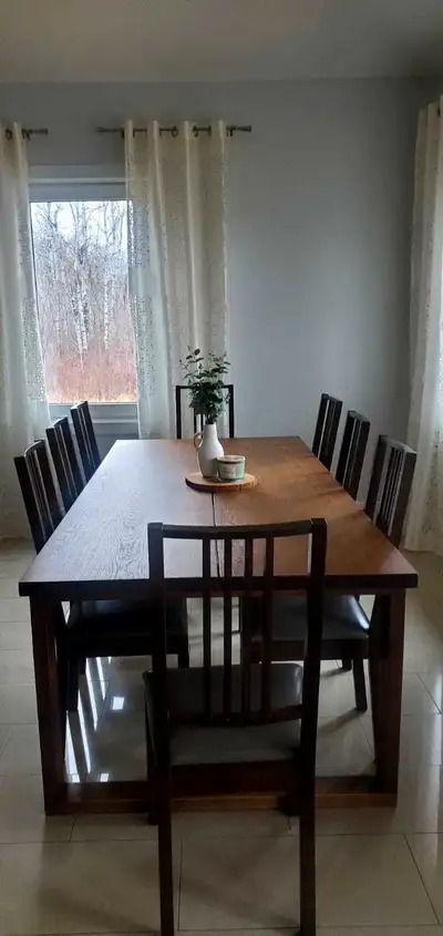 Table is 88" x 38" 8 chairs faux leather bench included. In clean pet free condition Must pick up It...