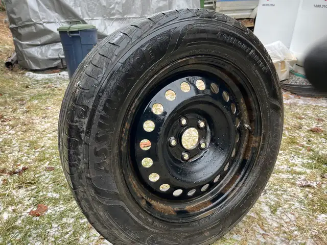 225/65 r16.  From a Nissan Rogue: Four tires and rims in Tires & Rims in Bedford - Image 2