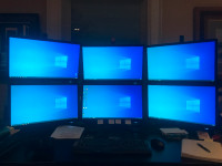 6 - 24 inch monitors with 3 stands, used but not much, like new.