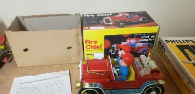 Vintage Tin Toy ME 699 Fire Chief Truck Battery Operated Collectible New In Box UP FOR SELL WE HAVE...