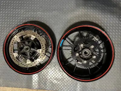 This is a good set of used 2017 BMW S1000RR cast rims. It is the complete rims with rotors, sprocket...