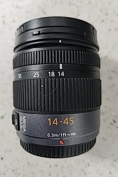 Panasonic Lumix G Vario 14-45mm f/3.5 - 5.6 ASPH. Mega O.I.S. Lens Purchased from Henry's but the pr...