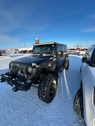 $15000 obo Lifted Jeep wrangler Full armour kit (steel cut away fenders, window guard) Matching fron...