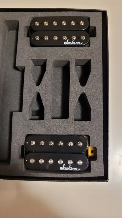 Removed from a NEW guitar, a set of Jackson high output Humbucker pickps, made by BELCAT Pickup in L...