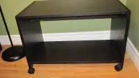 Black TV stand/cart on wheels