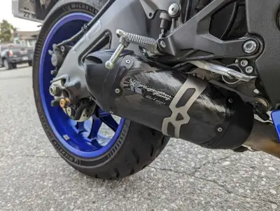 This is a 2017 Yamaha R1 sportbike. It's blue and black with white accents. The engine displacement...