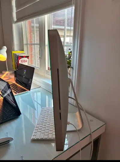 Selling my used Apple iMac 21.5" from 2011, a sleek all-in-one desktop computer that's perfect for h...