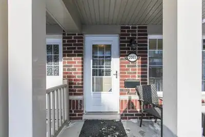spacious entry open to the den, eat-in kitchen with access to balcony with gas BBQ, hardwood floor i...