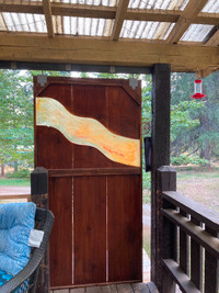 Custom made barn door cedar with epoxy wave