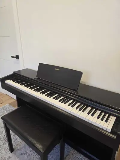 YAMAHA ARIUS YDP-143 DIGITAL PIANO WITH A CHAIR, View more