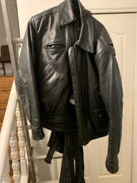 Black leather motorcycle jacket and leather chaps