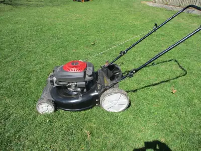 Push lawn mower, runs great, large rear wheels, no bag $115