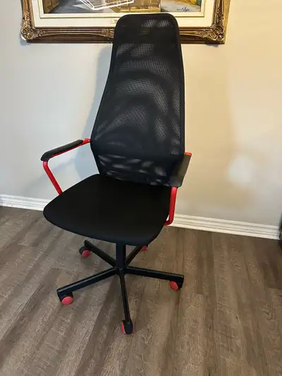 This is an IKEA Markus office chair, ready to provide excellent support during your work or gaming s...