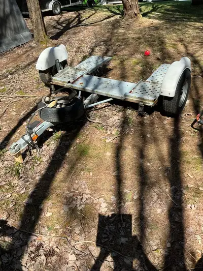 Forrest River dolly nice shape. Good tires. Has breaks and straps. 2 inch ball Possible trade for at...