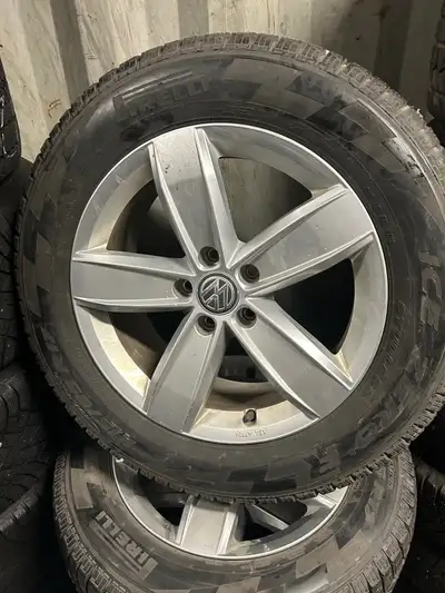 17” OEM VW Tiguan wheels with 215-65-17 pirelli ice zero winter tires . In very good condition. Tire...