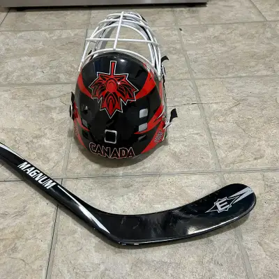 A hockey helmet and hockey stick for sale with free roller skate, View more