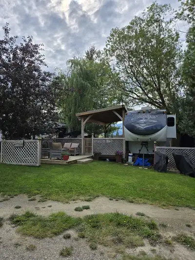 RV on seansonal Leased Lot at Lakeshore Campground Windermere BC Fenced yard, two shed, minutes from...