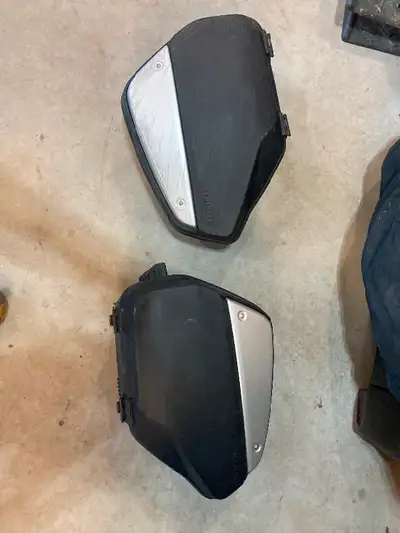 OEM Rear hard bags for a 2015 Suzuki Vstrom 1000. Bags do have some damage to the mounts and some sc...