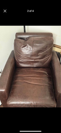 For sale!ROOTS dark brown leather arm chair 