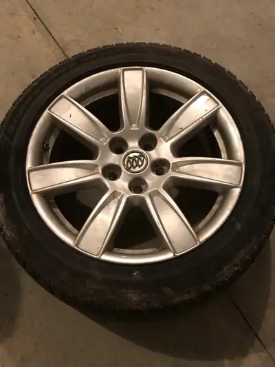Have set of 4 snow tires mounted and balanced on aluminum rims for sale. - they came off 2014 Buick...