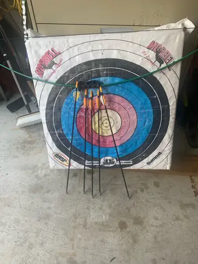 Youth archery set, excellent condition. Includes: Bow 5 arrows Double sided target - measures 28 x 2...