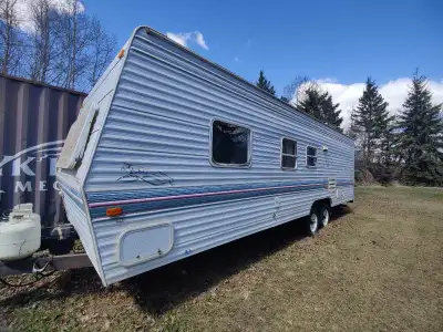 27" Prowler Holiday trailer. Sleeps 8, with shower, gas stove, oven, furnace. Has a queen size bed,...