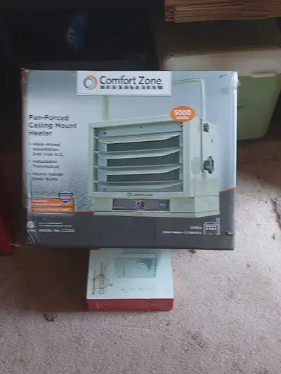 Comfort Zone electric space heater for garage or workshop. Ceiling mounted, hard wired, fan forced....