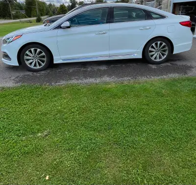 Second owner, low km Hyundai Sonata Sport Tech, features dual zone auto climate control, panoramic s...