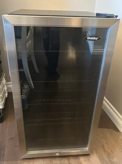 Danby 3.5 cubic foot free standing mini refrigerator / beverage center. Holds up to 120 cans - measu...