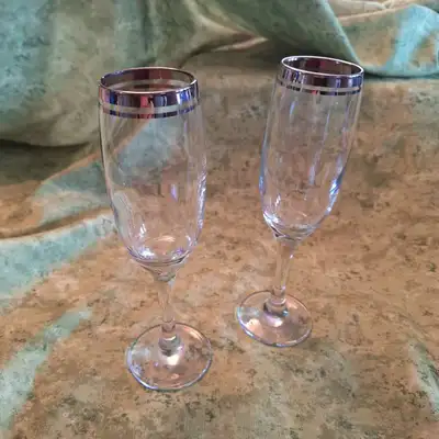 Silver rimmed champagne flutes x 11, View more