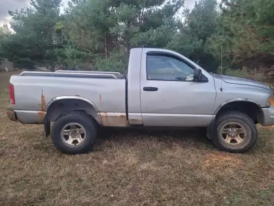 $2900 great working truck needs work on box ..lift kit mud tires