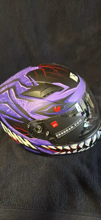 This is a CKX Gear Venom helmet, perfect for motorcycle, snowmobile, or ATV riders looking for safet...