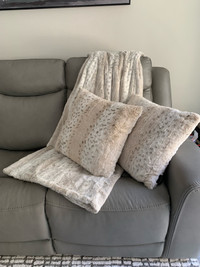 Comfy cozy faux fur throw and cushions 