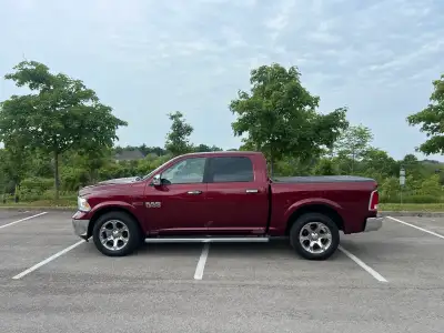 This is a Ram 1500 pickup truck, known for its robust performance and reliability. This truck is a u...