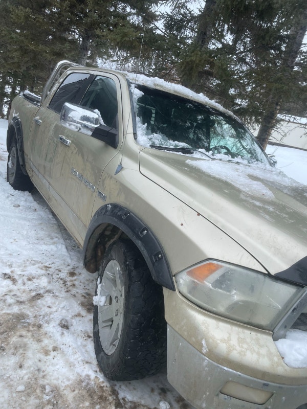 Selling a 2011 Ram 1500 LARAMIE CREW CAB 4X45500 OBO AS IS Cars