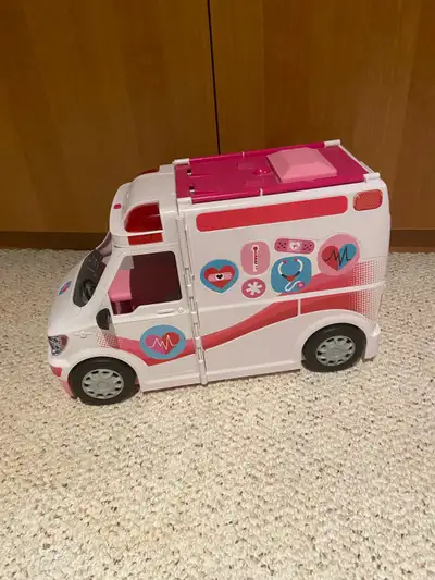Imaginative play. Barbie brand ambulance. Accessories included Has functional siren Pick up Northeas...
