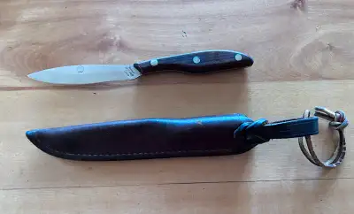 Grohmann Russell Belt Knife, Made in Nova Scotia, Canada. Has a 4” stainless steel blade and 4” ambi...