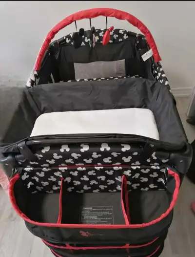 Mickey Mouse baby crib, in excellent condition. used like new.