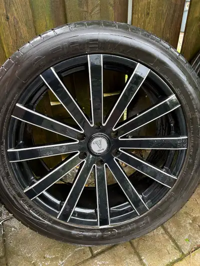I'm selling a set of four used tires with rims, size 305/40ZR22 114W. These tires have been previous...