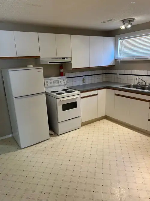 2 bedroom basement suite.Utilities included. Fenced back yard, private parking for2, close to Crowfo...