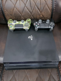 PS4 Console (with 2 controllers) 