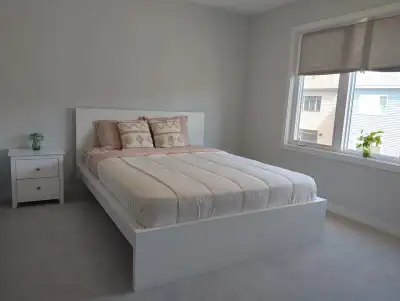 A bright and spacious master bedroom with a private attached bathroom and walk-in closet available f...