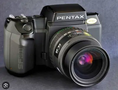 PENTAX SF10 FILM Camera + 50mm or / ou Zoom  (K1000), View more