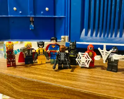 Set of 8 superheroes Minifigs lot. Son had it in a display case so never played with. Excellent cond...